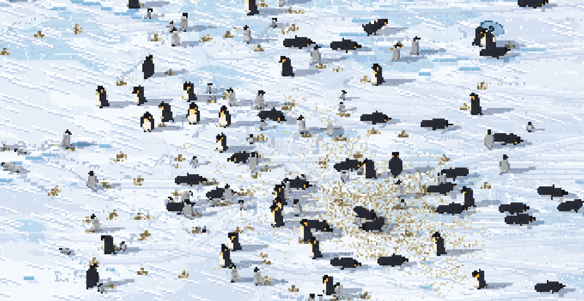The emperor penguin colony on the sea ice, with grey chicks standing among the adults and other adults lying on their bellies